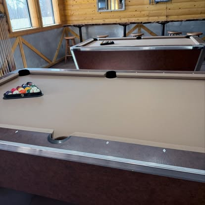 Pool tables inside Saddle Up